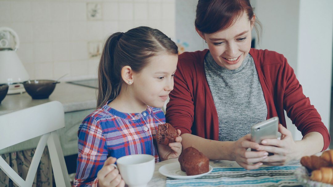 Family reviewing insurance documents at home
