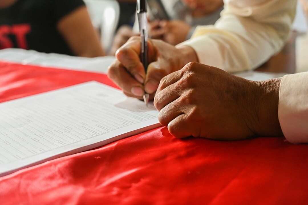 couple signing insurance contract