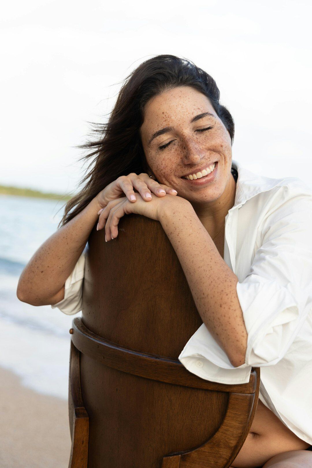Happy Mexican woman client portrait smiling outdoors